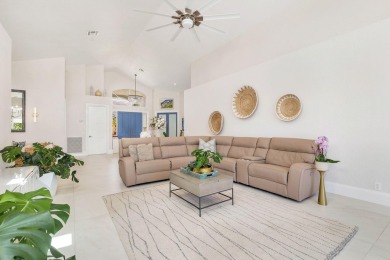 Nestled within a prestigious, gated community, this model on Ironhorse Country Club in Florida - for sale on GolfHomes.com, golf home, golf lot
