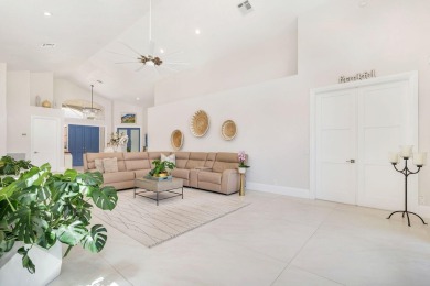 Nestled within a prestigious, gated community, this model on Ironhorse Country Club in Florida - for sale on GolfHomes.com, golf home, golf lot