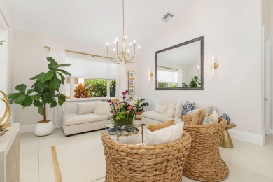 Nestled within a prestigious, gated community, this model on Ironhorse Country Club in Florida - for sale on GolfHomes.com, golf home, golf lot