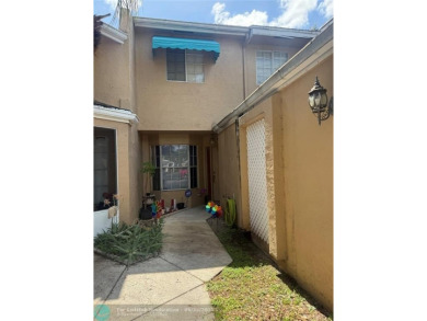 Well maintained and very spacious 3/2.5 townhome in Woodmont on  in Florida - for sale on GolfHomes.com, golf home, golf lot