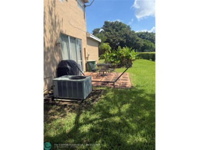 Well maintained and very spacious 3/2.5 townhome in Woodmont on  in Florida - for sale on GolfHomes.com, golf home, golf lot