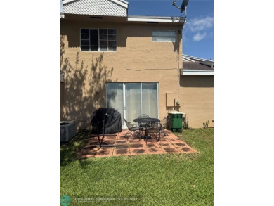 Well maintained and very spacious 3/2.5 townhome in Woodmont on  in Florida - for sale on GolfHomes.com, golf home, golf lot