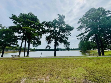 AFFORDABLE BEACH LIVING AT CRYSTAL LAKE! Whether you're looking on Prestwick Country Club in South Carolina - for sale on GolfHomes.com, golf home, golf lot