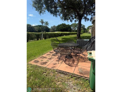 Well maintained and very spacious 3/2.5 townhome in Woodmont on  in Florida - for sale on GolfHomes.com, golf home, golf lot