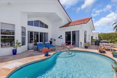 Nestled within a prestigious, gated community, this model on Ironhorse Country Club in Florida - for sale on GolfHomes.com, golf home, golf lot