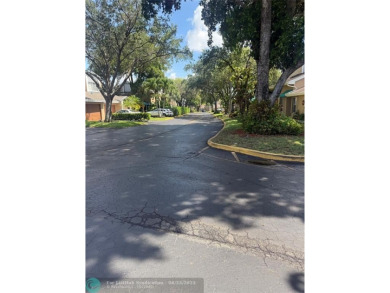 Well maintained and very spacious 3/2.5 townhome in Woodmont on  in Florida - for sale on GolfHomes.com, golf home, golf lot