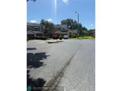 Well maintained and very spacious 3/2.5 townhome in Woodmont on  in Florida - for sale on GolfHomes.com, golf home, golf lot