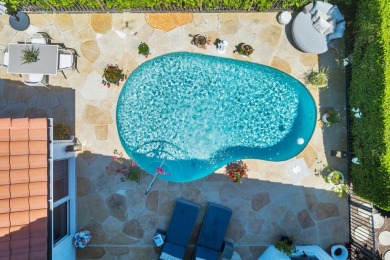 Nestled within a prestigious, gated community, this model on Ironhorse Country Club in Florida - for sale on GolfHomes.com, golf home, golf lot