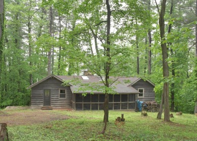 3 bedroom cabin on 4 beautiful wooded lots totaling 1.88 acres on Hide-A-Way Hills Club in Ohio - for sale on GolfHomes.com, golf home, golf lot