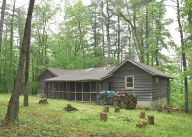 3 bedroom cabin on 4 beautiful wooded lots totaling 1.88 acres on Hide-A-Way Hills Club in Ohio - for sale on GolfHomes.com, golf home, golf lot