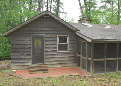 3 bedroom cabin on 4 beautiful wooded lots totaling 1.88 acres on Hide-A-Way Hills Club in Ohio - for sale on GolfHomes.com, golf home, golf lot