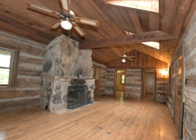 3 bedroom cabin on 4 beautiful wooded lots totaling 1.88 acres on Hide-A-Way Hills Club in Ohio - for sale on GolfHomes.com, golf home, golf lot