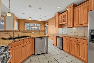 Enjoy your own slice of paradise! This beautiful 4 bedroom, 3 on The Legends of Massillon in Ohio - for sale on GolfHomes.com, golf home, golf lot