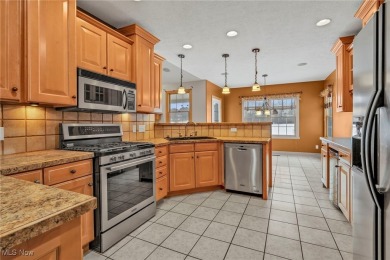 Enjoy your own slice of paradise! This beautiful 4 bedroom, 3 on The Legends of Massillon in Ohio - for sale on GolfHomes.com, golf home, golf lot