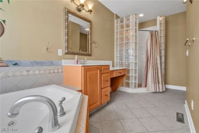Enjoy your own slice of paradise! This beautiful 4 bedroom, 3 on The Legends of Massillon in Ohio - for sale on GolfHomes.com, golf home, golf lot