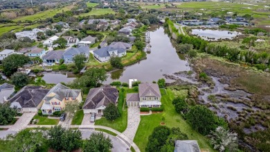 Experience The Ultimate Florida Waterfront Lifestyle In This on Marsh Valley Country Club in Florida - for sale on GolfHomes.com, golf home, golf lot