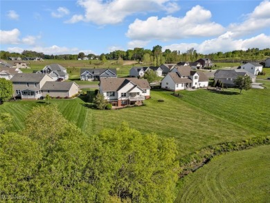 Enjoy your own slice of paradise! This beautiful 4 bedroom, 3 on The Legends of Massillon in Ohio - for sale on GolfHomes.com, golf home, golf lot
