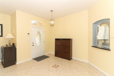 Nestled within tree-lined streets and mature landscaping in the on Victoria Hills Golf Club in Florida - for sale on GolfHomes.com, golf home, golf lot