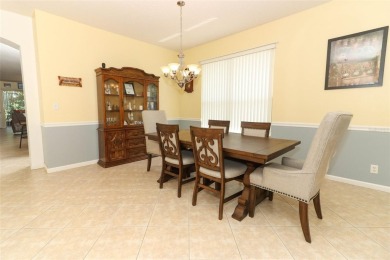 Nestled within tree-lined streets and mature landscaping in the on Victoria Hills Golf Club in Florida - for sale on GolfHomes.com, golf home, golf lot