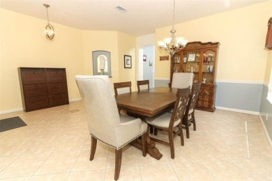 Nestled within tree-lined streets and mature landscaping in the on Victoria Hills Golf Club in Florida - for sale on GolfHomes.com, golf home, golf lot