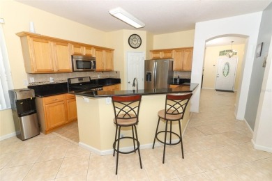 Nestled within tree-lined streets and mature landscaping in the on Victoria Hills Golf Club in Florida - for sale on GolfHomes.com, golf home, golf lot