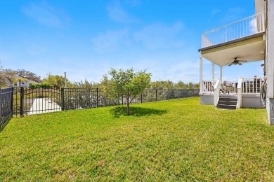 Experience The Ultimate Florida Waterfront Lifestyle In This on Marsh Valley Country Club in Florida - for sale on GolfHomes.com, golf home, golf lot