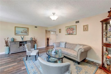 Rare First-Floor Corner Unit in The Coves of Aberdeen East! This on The Links At Boynton Beach - The Family Course in Florida - for sale on GolfHomes.com, golf home, golf lot