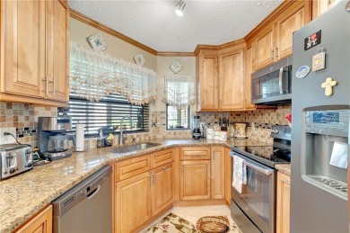 Rare First-Floor Corner Unit in The Coves of Aberdeen East! This on The Links At Boynton Beach - The Family Course in Florida - for sale on GolfHomes.com, golf home, golf lot