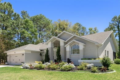 Discover unparalleled charm and comfort in this beautifully on Southern Woods Golf Club in Florida - for sale on GolfHomes.com, golf home, golf lot