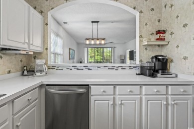Enjoy resort-style living in this fully furnished 2-bedroom on Barefoot Resort and Golf Club  in South Carolina - for sale on GolfHomes.com, golf home, golf lot