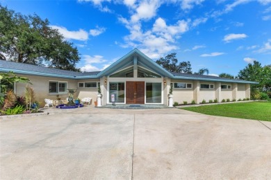 Welcome to your dream oasis at 8711 East Cresco Lane, a on Inverness Golf and Country Club in Florida - for sale on GolfHomes.com, golf home, golf lot