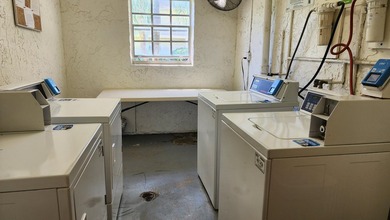 Stunningly renovated and rarely available, this spacious on Lakeview Golf Club in Florida - for sale on GolfHomes.com, golf home, golf lot