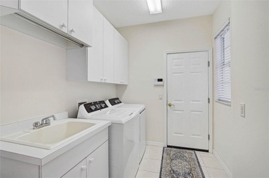 BRAND NEW ROOF on this 4 bedroom 3.5 bathroom golf course home on Calusa Lakes Golf Club in Florida - for sale on GolfHomes.com, golf home, golf lot