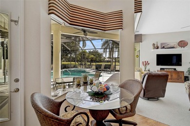 BRAND NEW ROOF on this 4 bedroom 3.5 bathroom golf course home on Calusa Lakes Golf Club in Florida - for sale on GolfHomes.com, golf home, golf lot