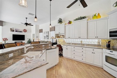 BRAND NEW ROOF on this 4 bedroom 3.5 bathroom golf course home on Calusa Lakes Golf Club in Florida - for sale on GolfHomes.com, golf home, golf lot