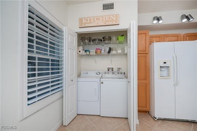 First-floor resort-style living, Furnished and beautifully on Colonial Country Club in Florida - for sale on GolfHomes.com, golf home, golf lot