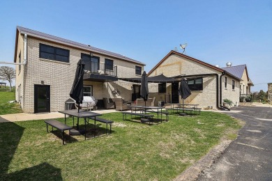 JUST WAIT UNTIL YOU SEE THIS ONE!!!  Spacious Home or Turnkey on Rolling Knolls Golf Course in Iowa - for sale on GolfHomes.com, golf home, golf lot
