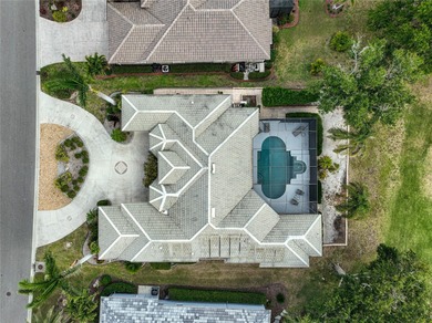 BRAND NEW ROOF on this 4 bedroom 3.5 bathroom golf course home on Calusa Lakes Golf Club in Florida - for sale on GolfHomes.com, golf home, golf lot