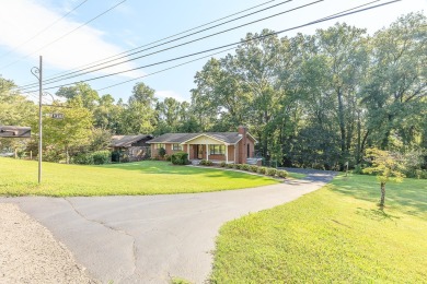 This all brick rancher with a finished basement is only minutes on Concord Golf Club in Tennessee - for sale on GolfHomes.com, golf home, golf lot
