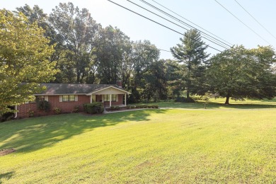 This all brick rancher with a finished basement is only minutes on Concord Golf Club in Tennessee - for sale on GolfHomes.com, golf home, golf lot