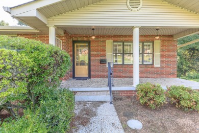This all brick rancher with a finished basement is only minutes on Concord Golf Club in Tennessee - for sale on GolfHomes.com, golf home, golf lot