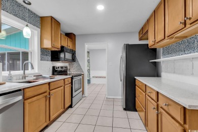 LOCATION is everything!  This spacious, four bedroom, two and a on Wicked Stick Golf Club in South Carolina - for sale on GolfHomes.com, golf home, golf lot