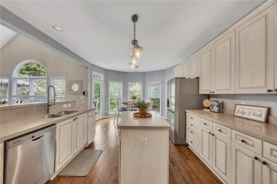 Perfectly positioned on the fairway of the par-5 2nd hole in the on Towne Lake Hills Golf Club in Georgia - for sale on GolfHomes.com, golf home, golf lot