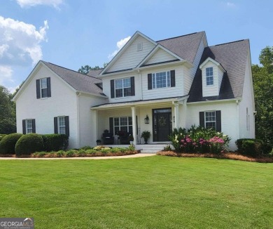 This custom home nestled on the 16th hole and is located in one on Oak Mountain Championship Golf Club in Georgia - for sale on GolfHomes.com, golf home, golf lot