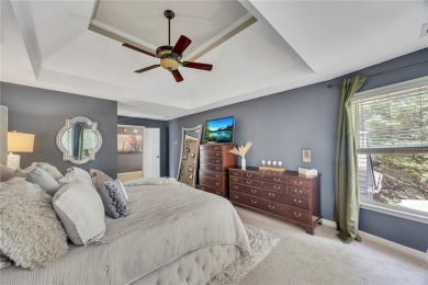 Perfectly positioned on the fairway of the par-5 2nd hole in the on Towne Lake Hills Golf Club in Georgia - for sale on GolfHomes.com, golf home, golf lot