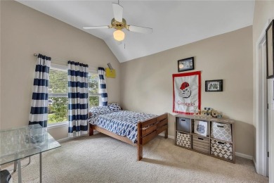 Perfectly positioned on the fairway of the par-5 2nd hole in the on Towne Lake Hills Golf Club in Georgia - for sale on GolfHomes.com, golf home, golf lot