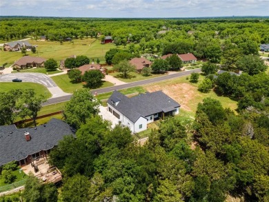 Stunning 3,252 SF contemporary-Modern farmhouse style home on on Pecan Plantation Country Club in Texas - for sale on GolfHomes.com, golf home, golf lot