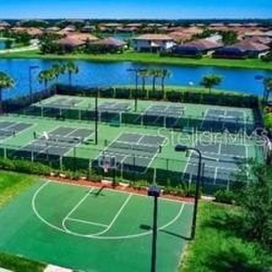 This 4-bedroom Social Deeded pool home will elevate your on River Strand Golf and Country Club At Heritage Harbour  in Florida - for sale on GolfHomes.com, golf home, golf lot