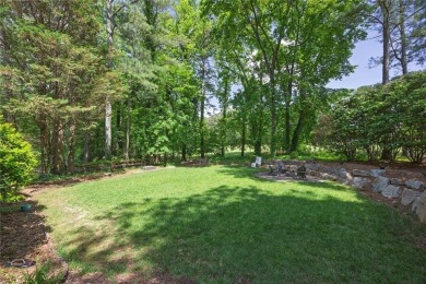 Perfectly positioned on the fairway of the par-5 2nd hole in the on Towne Lake Hills Golf Club in Georgia - for sale on GolfHomes.com, golf home, golf lot