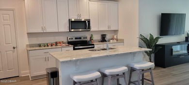 Brand new energy efficient home ready for a buyer NOW.  Modern on LPGA International Golf Course in Florida - for sale on GolfHomes.com, golf home, golf lot